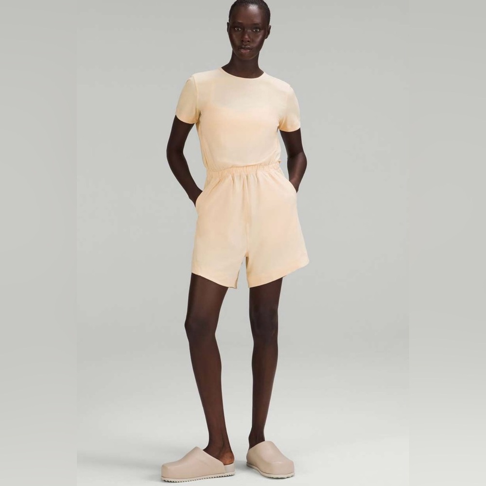 Lululemon lightweight high neck open back romper in prosecco nwt size 8